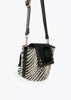 Sale Bolsito bandolera tipo cesta Bolsos