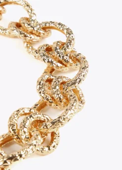 Collar gargantilla dorada con textura Collares