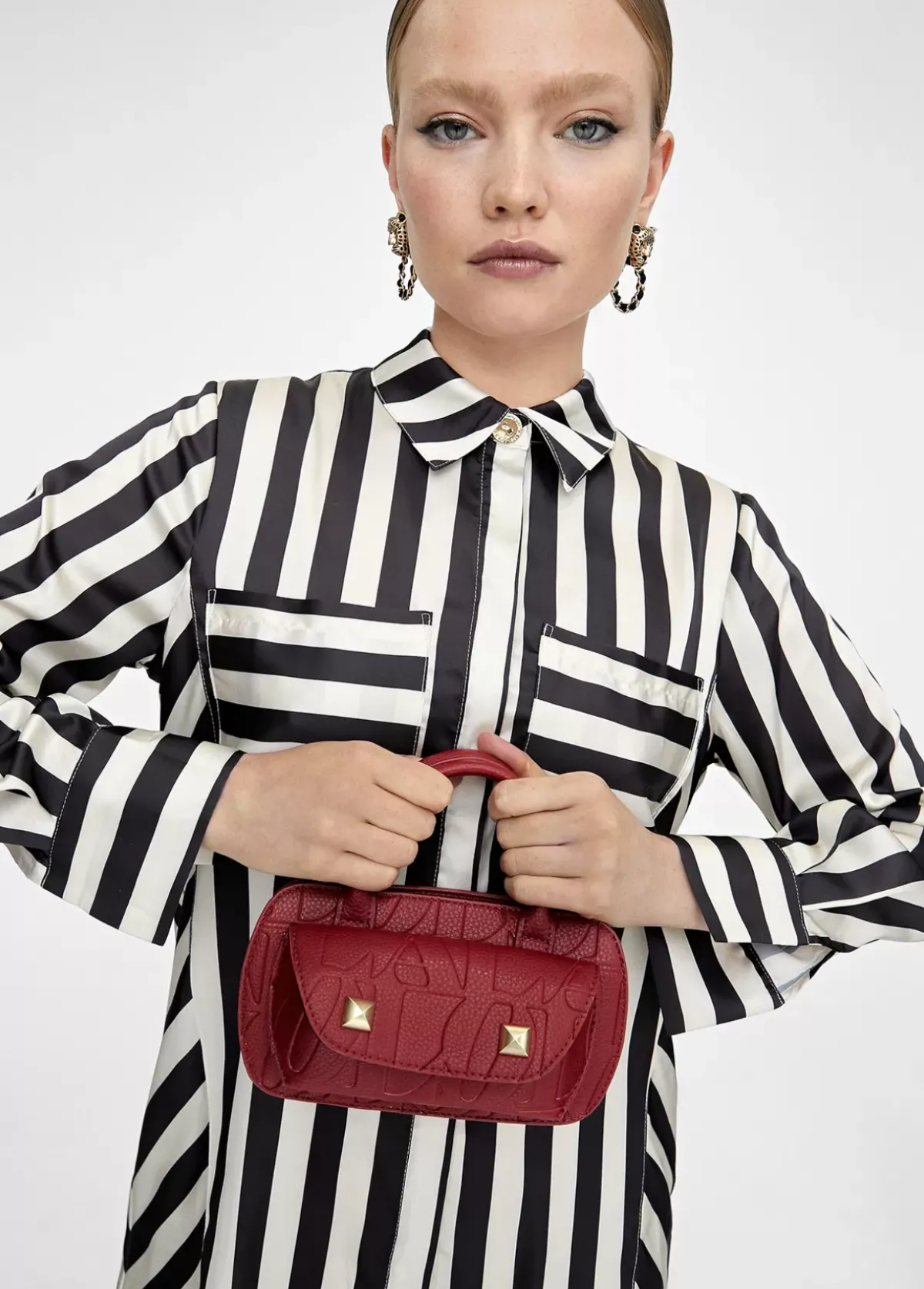 Mini bandolera con logo grabado Bolsos