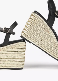 Sale Sandalia tipo cuña metalizada Calzado