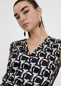 Hot Top fluido monograma Camisetas Y Tops